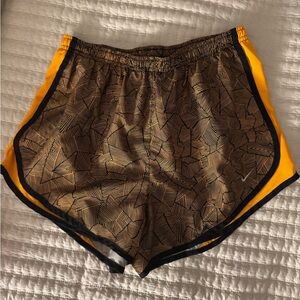 Nike Women's Black and Yellow Patterned Athletic Shorts